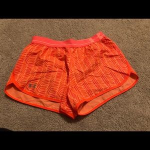 Orange Underarmour athletic shorts